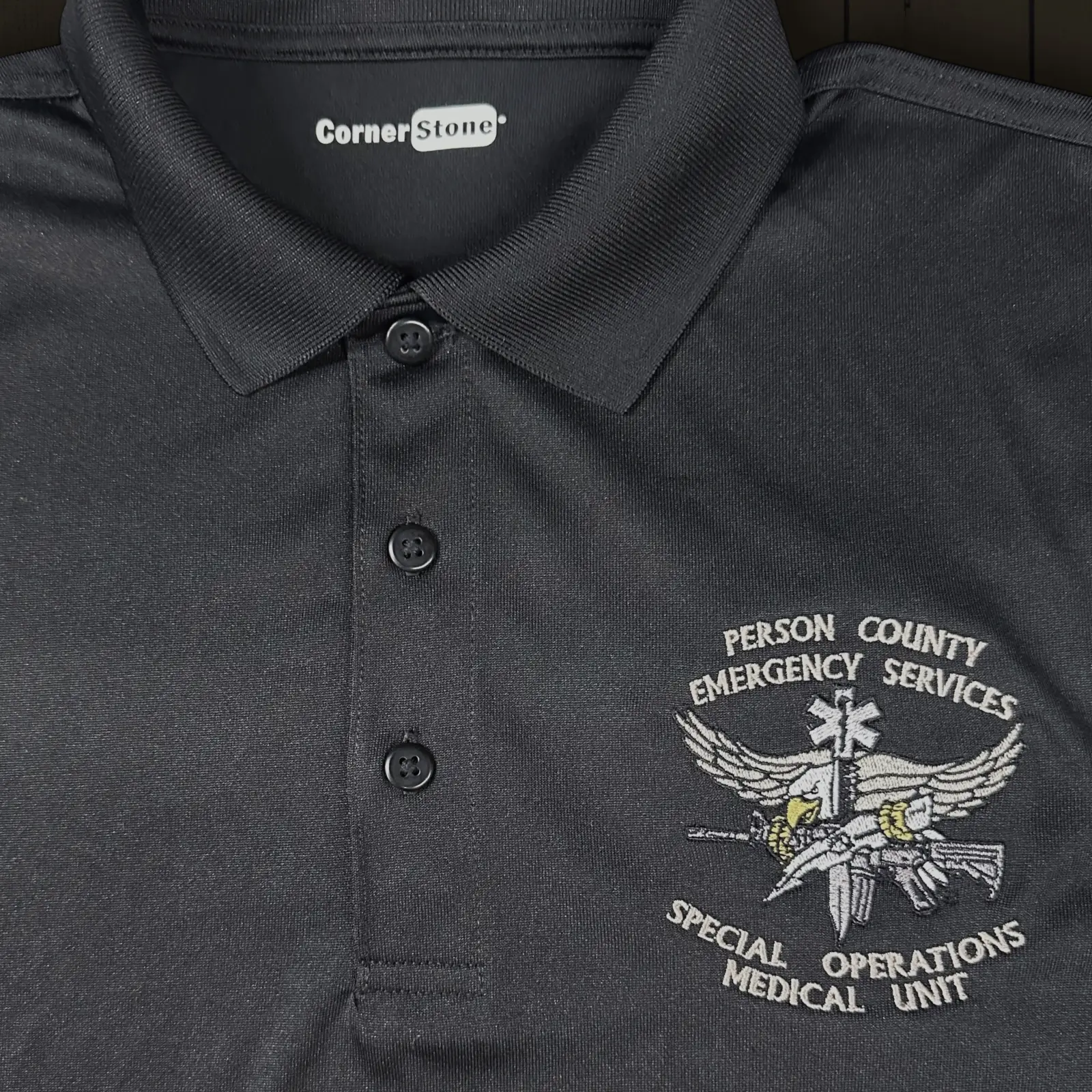 An embroidered agency polo